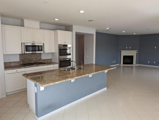 Fireplace, Interior, Kitchen, Recessed Lighting, Stainless Steel Appliances
