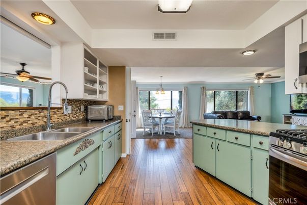 Dining room, Interior, Kitchen, Pendant Lights, Stainless Steel Appliances, Wood Texture Flooring