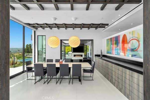 Dining room, Fireplace, Interior, Pendant Lights, Recessed Lighting, Water, Wooden Beams