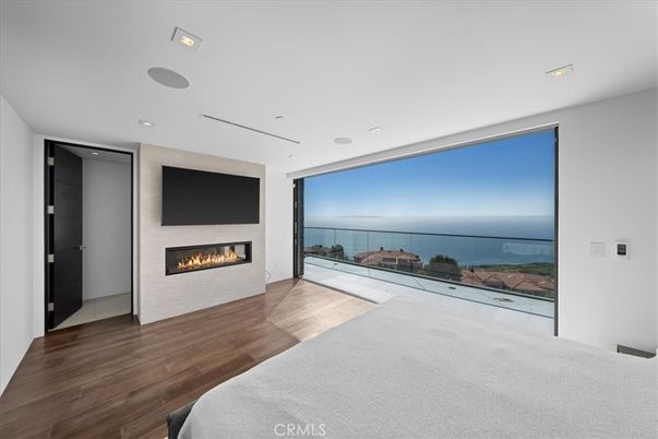 Empty room, Fireplace, Interior, Recessed Lighting, Water, Wood Texture Flooring