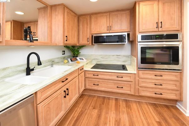 Interior, Kitchen, Recessed Lighting, Stainless Steel Appliances, Wood Texture Flooring