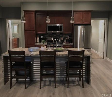 Interior, Kitchen, Pendant Lights, Stainless Steel Appliances, Wood Texture Flooring