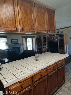 Fireplace, Interior, Kitchen, Tile Countertops