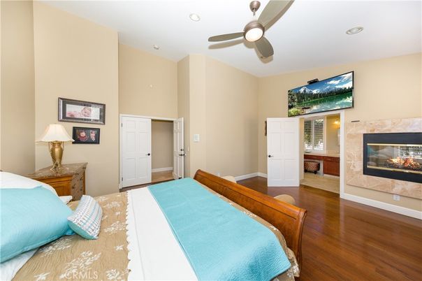 Bedroom, Fireplace, Interior, Recessed Lighting, Wood Texture Flooring