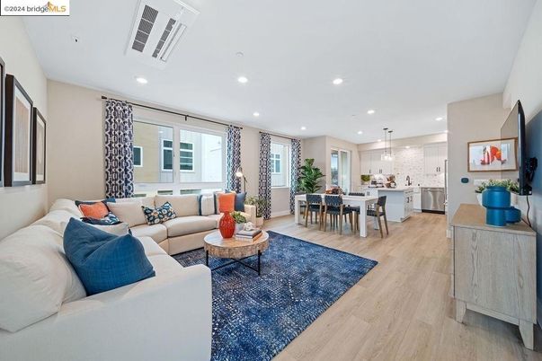 Dining room, Interior, Kitchen, Living room, Pendant Lights, Recessed Lighting, Stainless Steel Appliances, Wood Texture Flooring