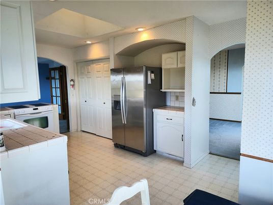 Interior, Kitchen, Recessed Lighting, Stainless Steel Appliances, Tile Countertops
