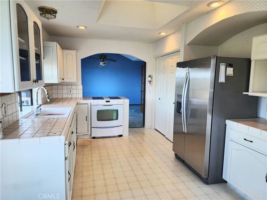 Interior, Kitchen, Recessed Lighting, Stainless Steel Appliances, Tile Countertops