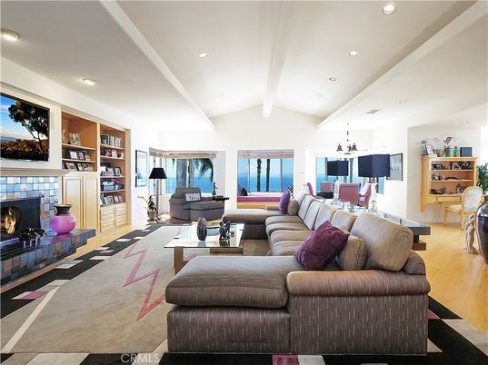 Chandelier, Dining room, Fireplace, Interior, Living room, Recessed Lighting, Water, Wood Texture Flooring