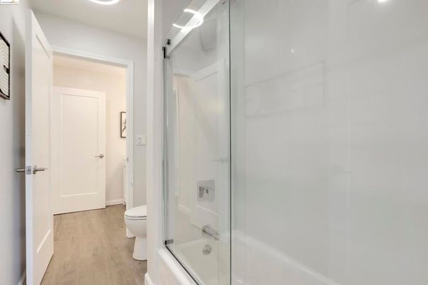 Bathroom, Glass Shower, Interior, Recessed Lighting, Wood Texture Flooring