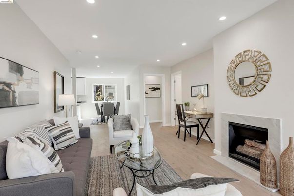 Dining room, Fireplace, Interior, Living room, Recessed Lighting, Wood Texture Flooring