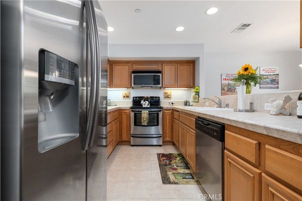 Interior, Kitchen, Recessed Lighting, Stainless Steel Appliances, Tile Countertops