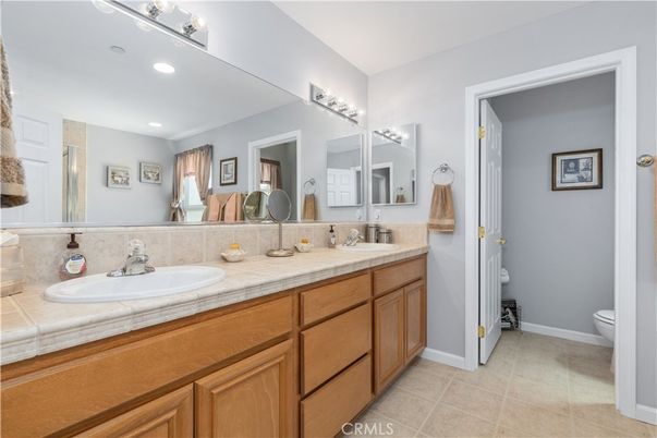 Bathroom, Dual Sink Vanities, Interior, Recessed Lighting, Tile Countertops