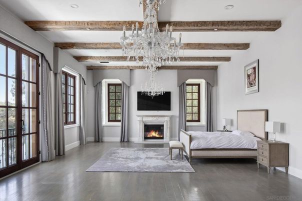Bedroom, Chandelier, Fireplace, Interior, Recessed Lighting, Wooden Beams, Wood Texture Flooring