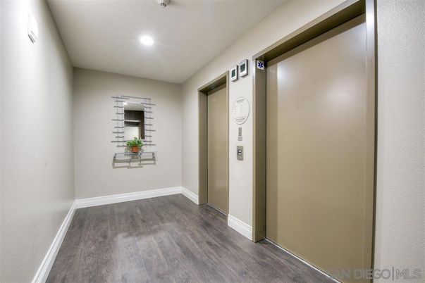 Elevator, Interior, Recessed Lighting, Wood Texture Flooring