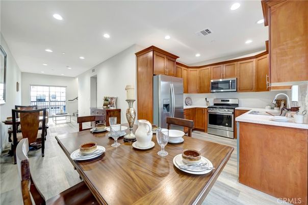 Dining room, Interior, Kitchen, Recessed Lighting, Stainless Steel Appliances, Wood Texture Flooring