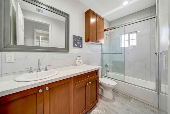 Bathroom, Glass Shower, Interior, Marble Walls, Recessed Lighting, Wood Texture Flooring