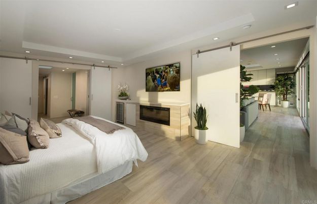 Bedroom, Fireplace, Interior, Recessed Lighting, Wood Texture Flooring
