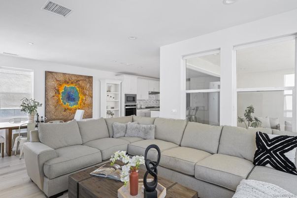 Dining room, Interior, Kitchen, Living room, Recessed Lighting, Stainless Steel Appliances, Wood Texture Flooring