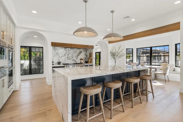Interior, Kitchen, Marble Walls, Pendant Lights, Recessed Lighting, Stainless Steel Appliances, Water, Wood Texture Flooring