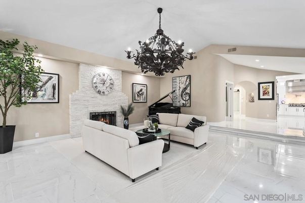 Chandelier, Fireplace, Interior, Living room, Marble, Piano, Recessed Lighting