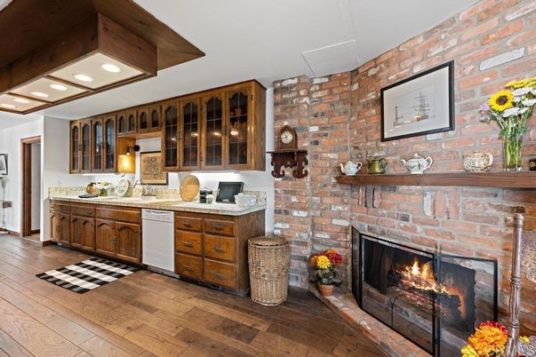 Fireplace, Interior, Kitchen, Recessed Lighting, Stone Walls, Wooden Beams, Wood Texture Flooring
