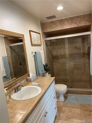 Bathroom, Dual Sink Vanities, Glass Shower, Interior, Recessed Lighting, Tile Countertops