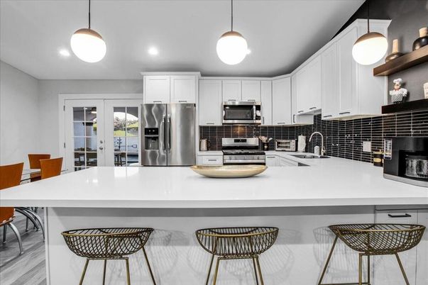 Interior, Kitchen, Pendant Lights, Recessed Lighting, Stainless Steel Appliances, Wood Texture Flooring