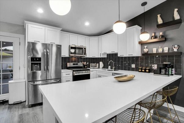 Interior, Kitchen, Pendant Lights, Recessed Lighting, Stainless Steel Appliances, Wood Texture Flooring