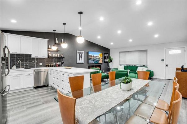 Dining room, Interior, Kitchen, Living room, Pendant Lights, Recessed Lighting, Stainless Steel Appliances, Wood Texture Flooring