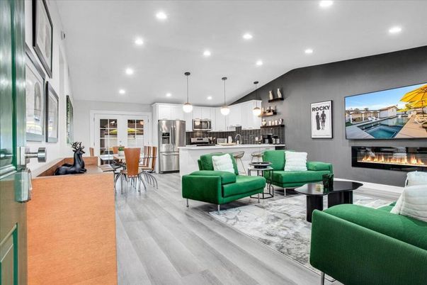 Dining room, Fireplace, Interior, Kitchen, Living room, Pendant Lights, Recessed Lighting, Stainless Steel Appliances, Wood Texture Flooring