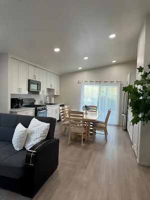 Dining room, Interior, Kitchen, Living room, Recessed Lighting, Stainless Steel Appliances, Wood Texture Flooring