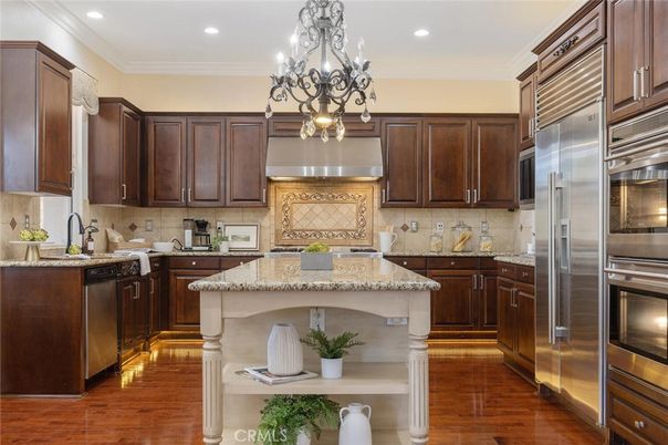 Chandelier, Interior, Kitchen, Recessed Lighting, Stainless Steel Appliances, Wood Texture Flooring