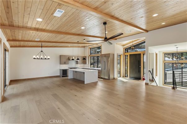 Empty room, Interior, Kitchen, Pendant Lights, Recessed Lighting, Stainless Steel Appliances, Wooden Beams, Wooden Ceilings, Wood Texture Flooring