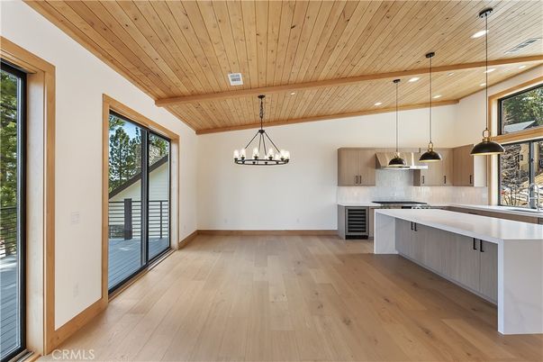 Chandelier, Interior, Kitchen, Pendant Lights, Recessed Lighting, Stainless Steel Appliances, Wooden Beams, Wooden Ceilings, Wood Texture Flooring