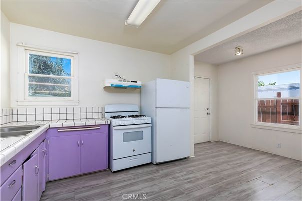 Interior, Kitchen, Tile Countertops, Wood Texture Flooring