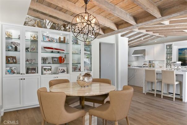 Chandelier, Dining room, Interior, Kitchen, Pendant Lights, Stainless Steel Appliances, Wooden Beams, Wooden Ceilings, Wood Texture Flooring