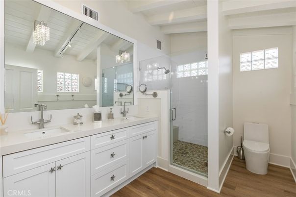 Bathroom, Dual Sink Vanities, Glass Shower, Interior, Wood Texture Flooring