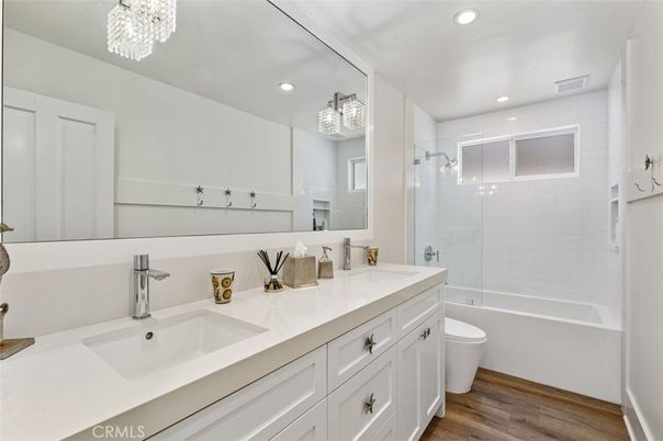 Bathroom, Dual Sink Vanities, Glass Shower, Interior, Recessed Lighting, Wood Texture Flooring
