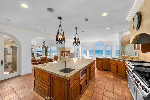 Chandelier, Dining room, Fireplace, Interior, Kitchen, Pendant Lights, Recessed Lighting, Stainless Steel Appliances, Water