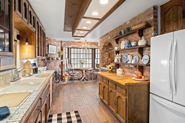 Chandelier, Dining room, Interior, Recessed Lighting, Stone Walls, Wooden Beams, Wood Texture Flooring