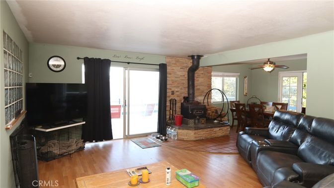 Dining room, Fireplace, Interior, Living room, Stone Walls, Wood Texture Flooring