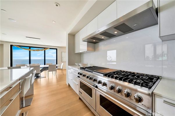 Dining room, Interior, Kitchen, Recessed Lighting, Stainless Steel Appliances, Water, Wood Texture Flooring