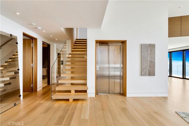 Elevator, Interior, Recessed Lighting, Wood Texture Flooring
