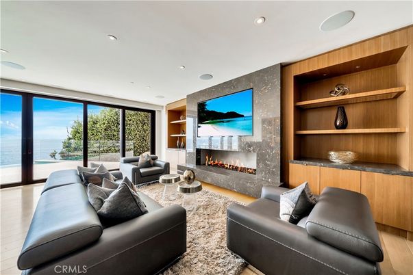 Fireplace, Interior, Living room, Recessed Lighting, Water, Wood Texture Flooring