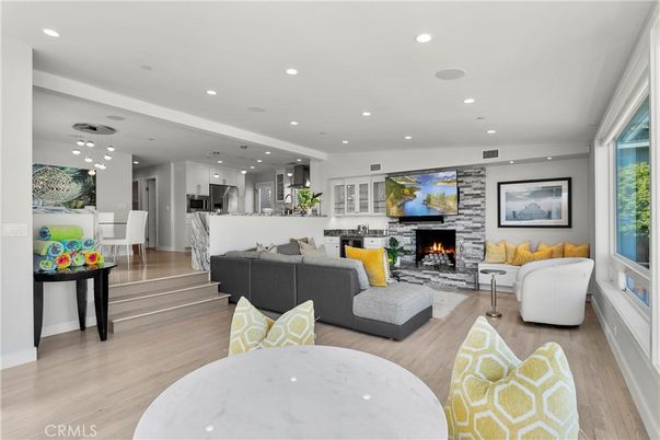 Fireplace, Interior, Kitchen, Living room, Recessed Lighting, Stone Walls, Wood Texture Flooring