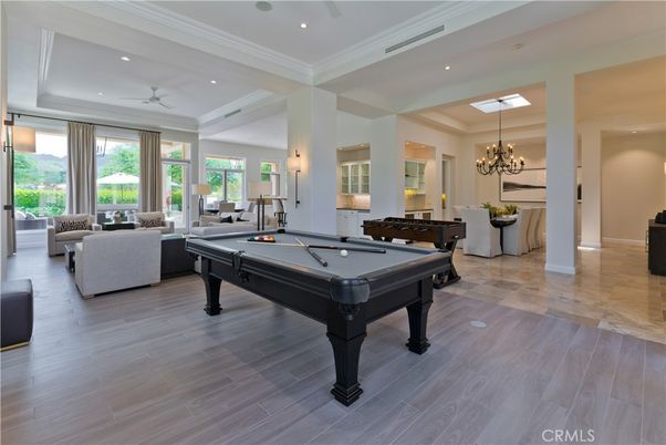 Billiard Table, Chandelier, Game Room, Interior, Living room, Recessed Lighting, Wood Texture Flooring