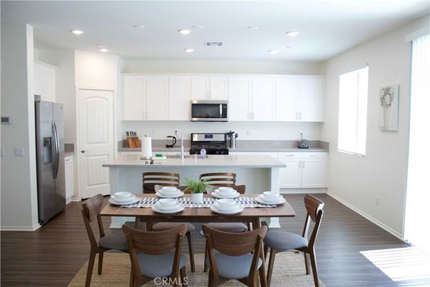 Dining room, Interior, Kitchen, Recessed Lighting, Stainless Steel Appliances, Wood Texture Flooring