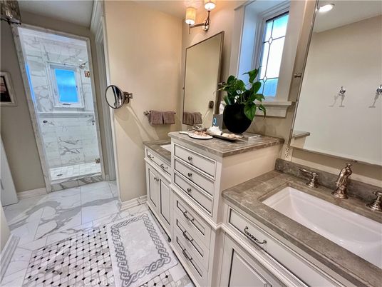 Bathroom, Dual Sink Vanities, Glass Shower, Interior, Marble, Recessed Lighting