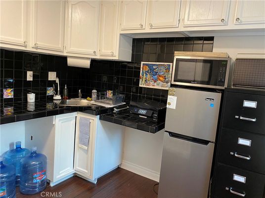 Interior, Kitchen, Tile Countertops, Wood Texture Flooring
