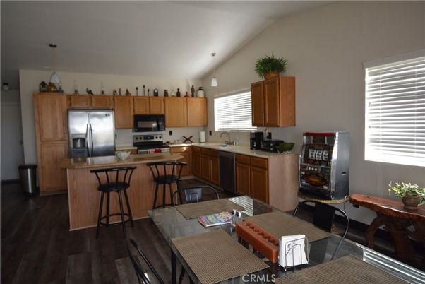 Dining room, Interior, Kitchen, Pendant Lights, Stainless Steel Appliances, Wood Texture Flooring
